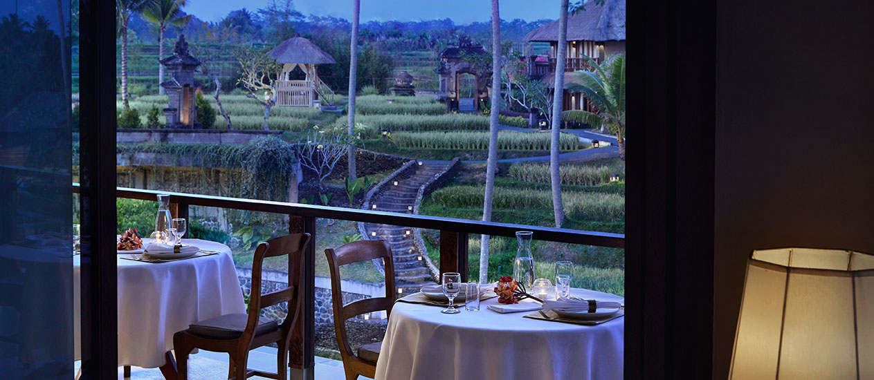 Petulu Restaurant at Kamandalu Ubud overlooking terraced rice paddies and tropical landscape Ubud. Petulu Restaurant is savor a mouthwatering selection of authentic Indonesian Archipelago cuisine against a stunning backdrop of rice paddies.